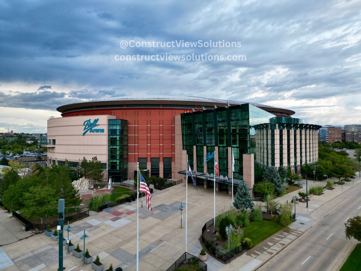 Aerial exterior view of a downtown arena and surrounding streetscape