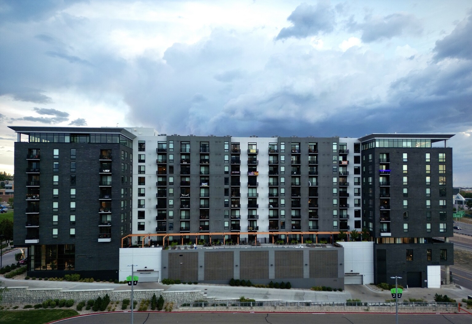 Aerial front-elevation view of a modern multifamily residential property